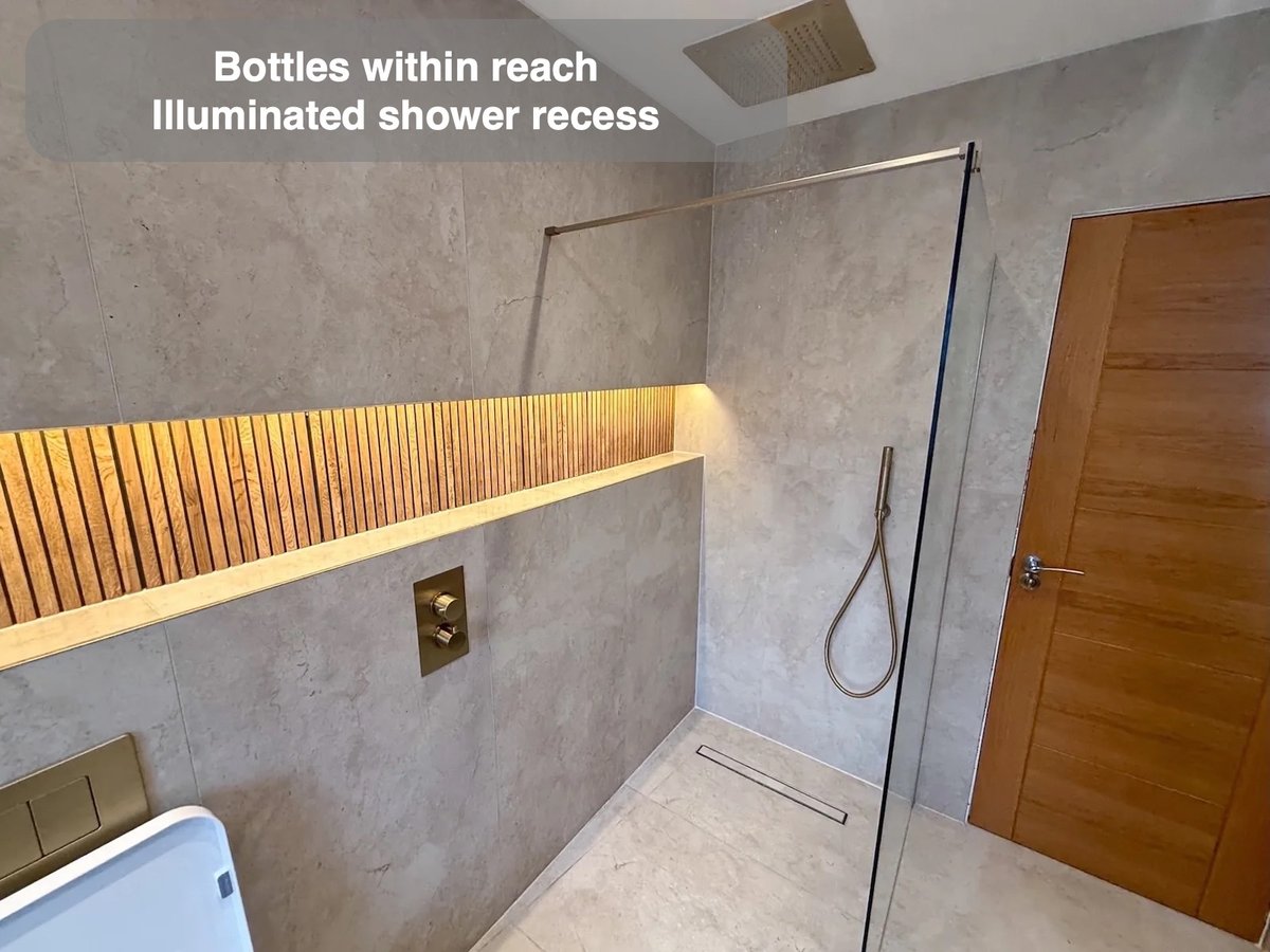 Bottles within reach — Illuminated shower recess