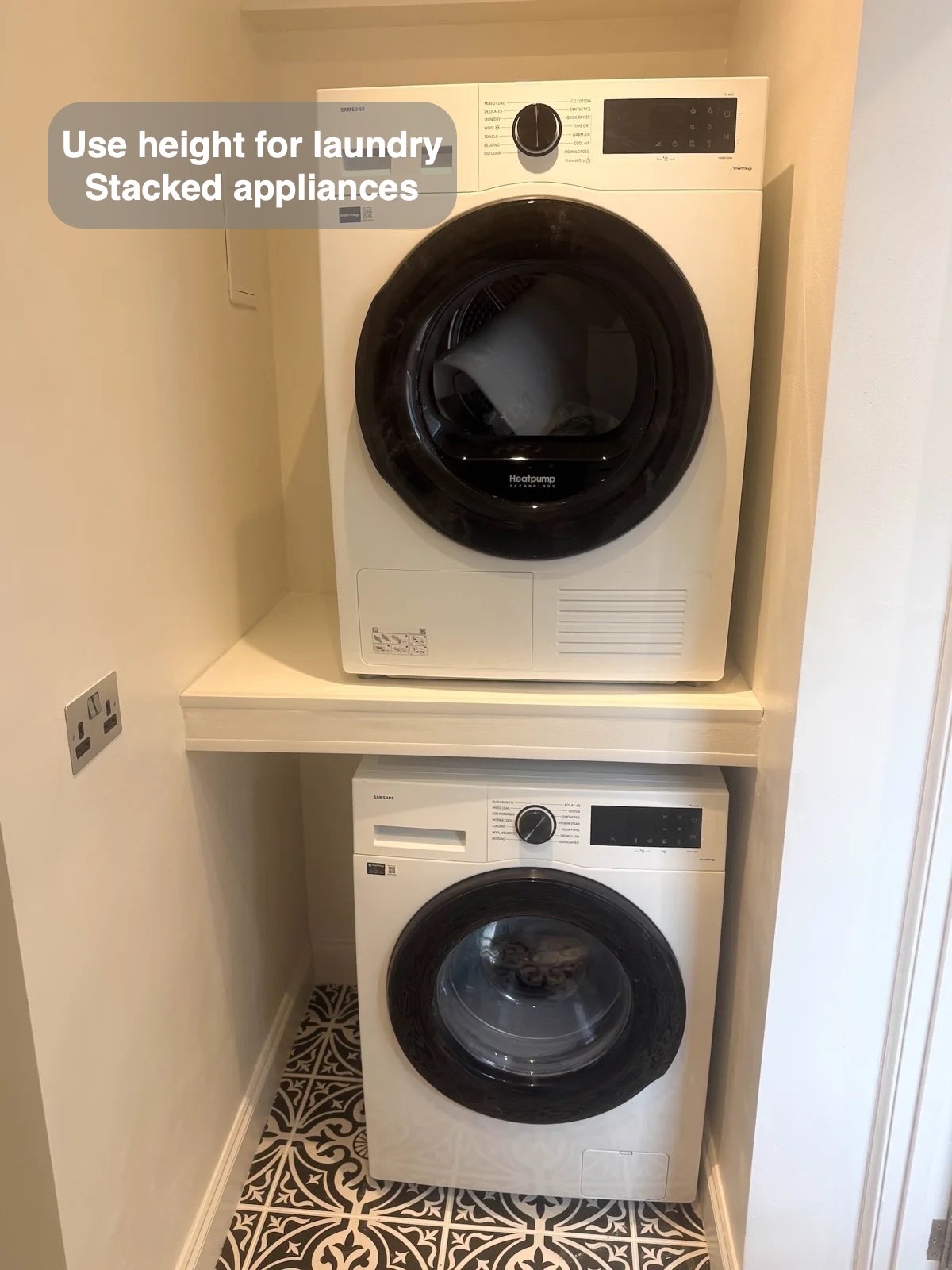 Stacked washer and dryer in utility area