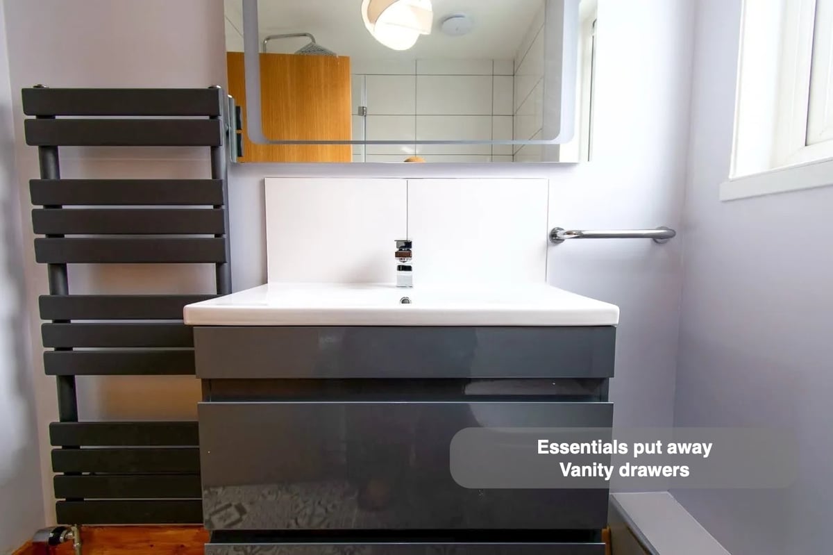 Storage close to the basin in the completed Balmedie bathroom