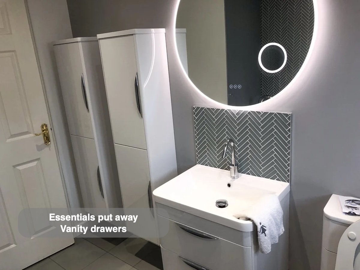 Storage close to the basin in the completed Westhill bathroom