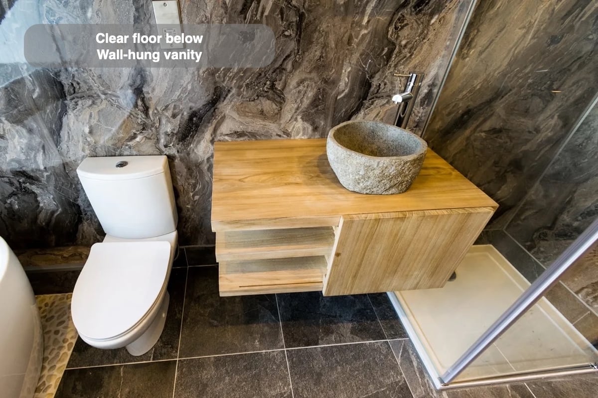 A clearer floor beneath the basin in the completed West End, Aberdeen bathroom