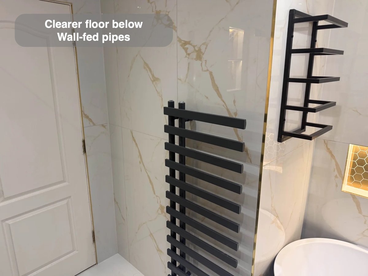 Towel radiator and wall shelving near bath