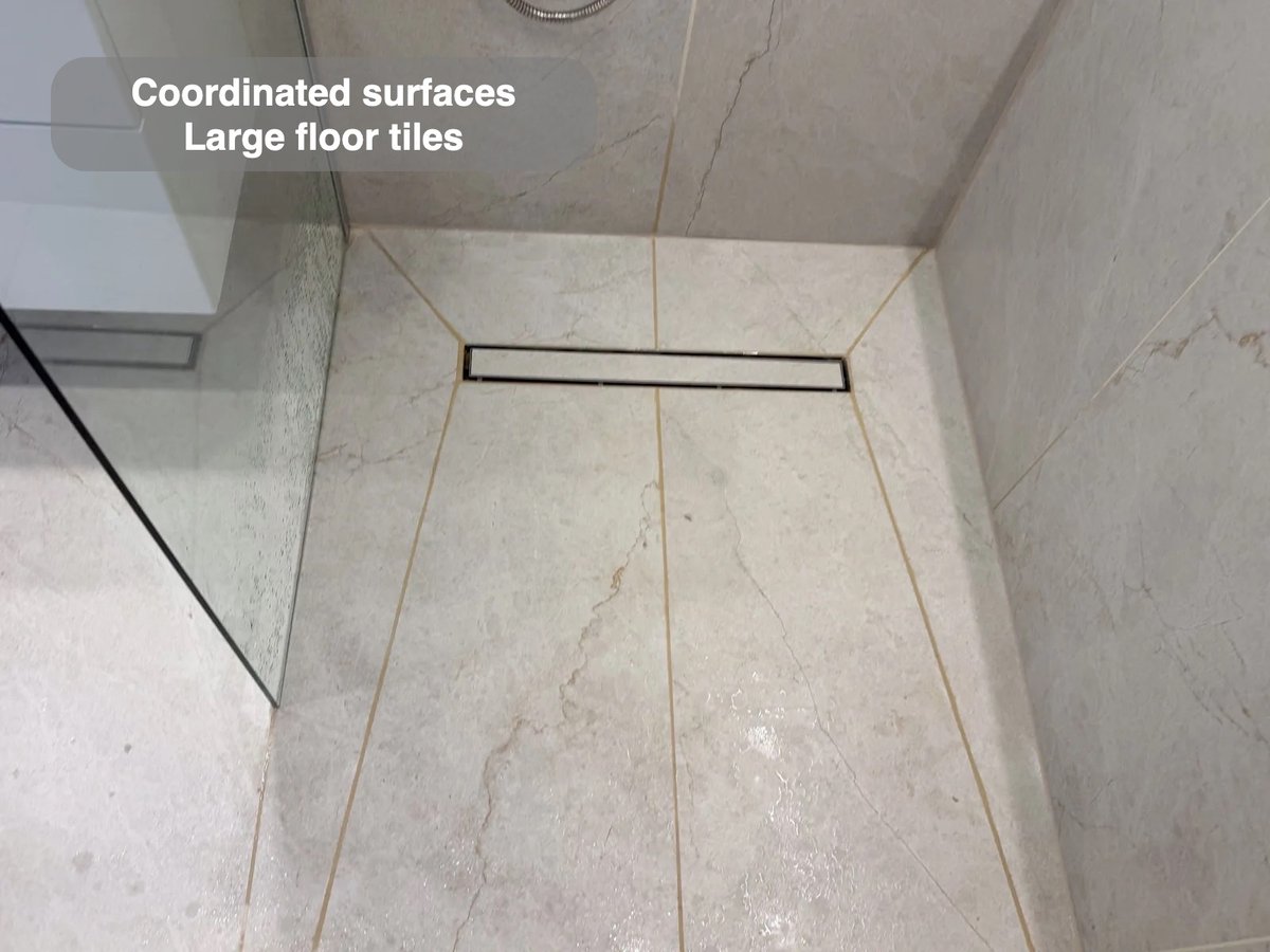Tiled shower floor with linear drainage