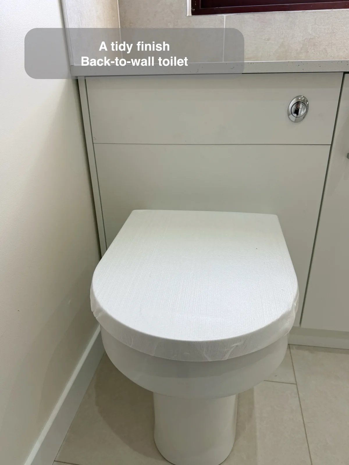 A practical basin and a coordinated WC area in the completed Kingswells bathroom