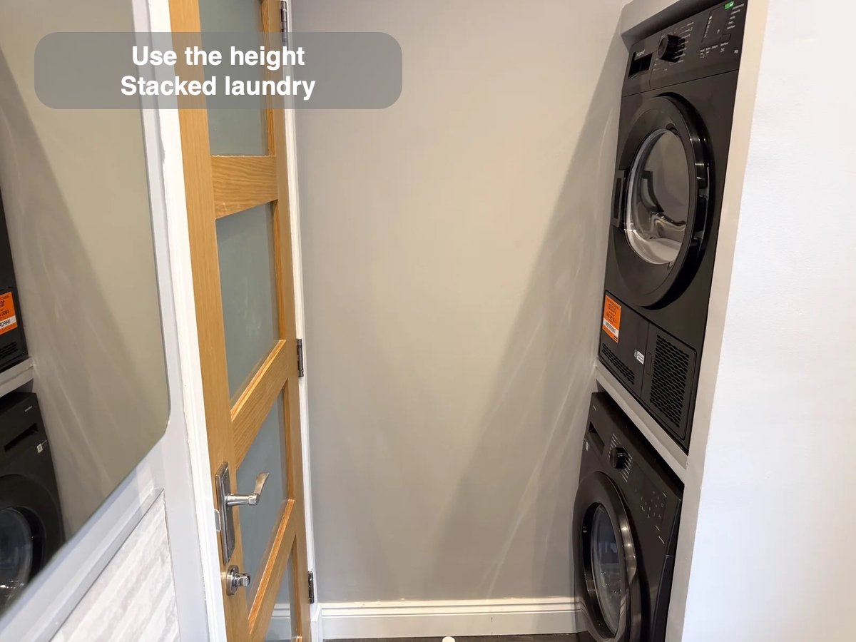 Stacked washing machine and dryer in purpose-built recess