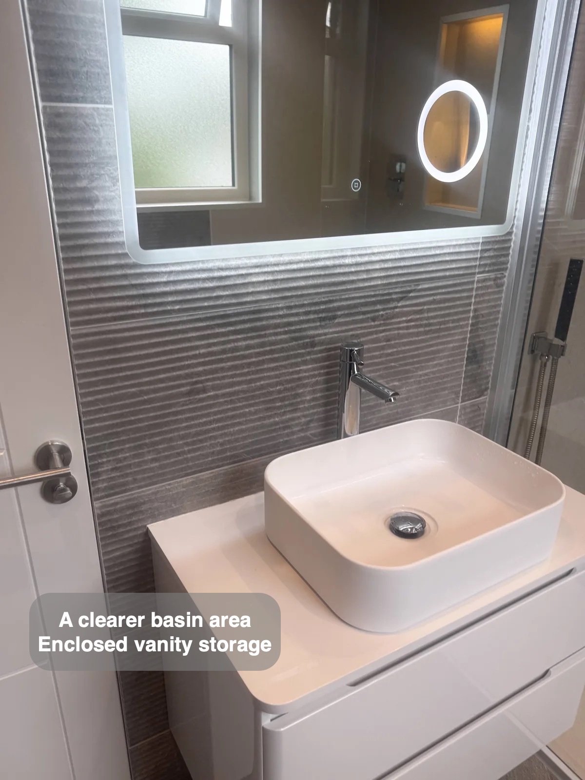 Wall-hung white vanity and mirror