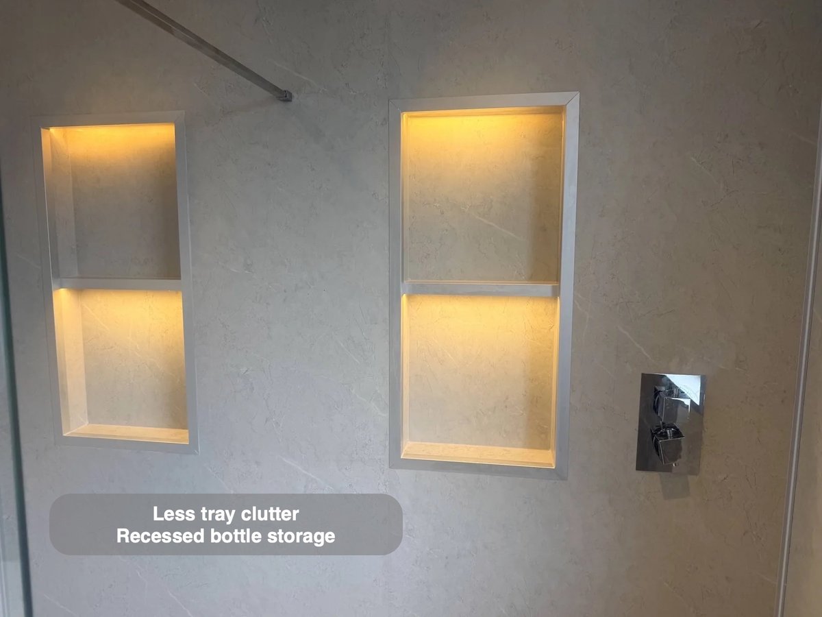 Two illuminated shower recesses
