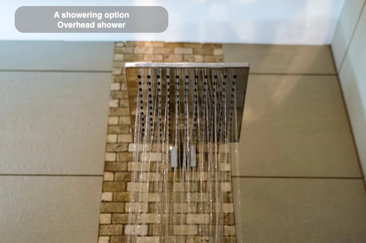 An overhead washing option in the completed Northfield, Aberdeen bathroom