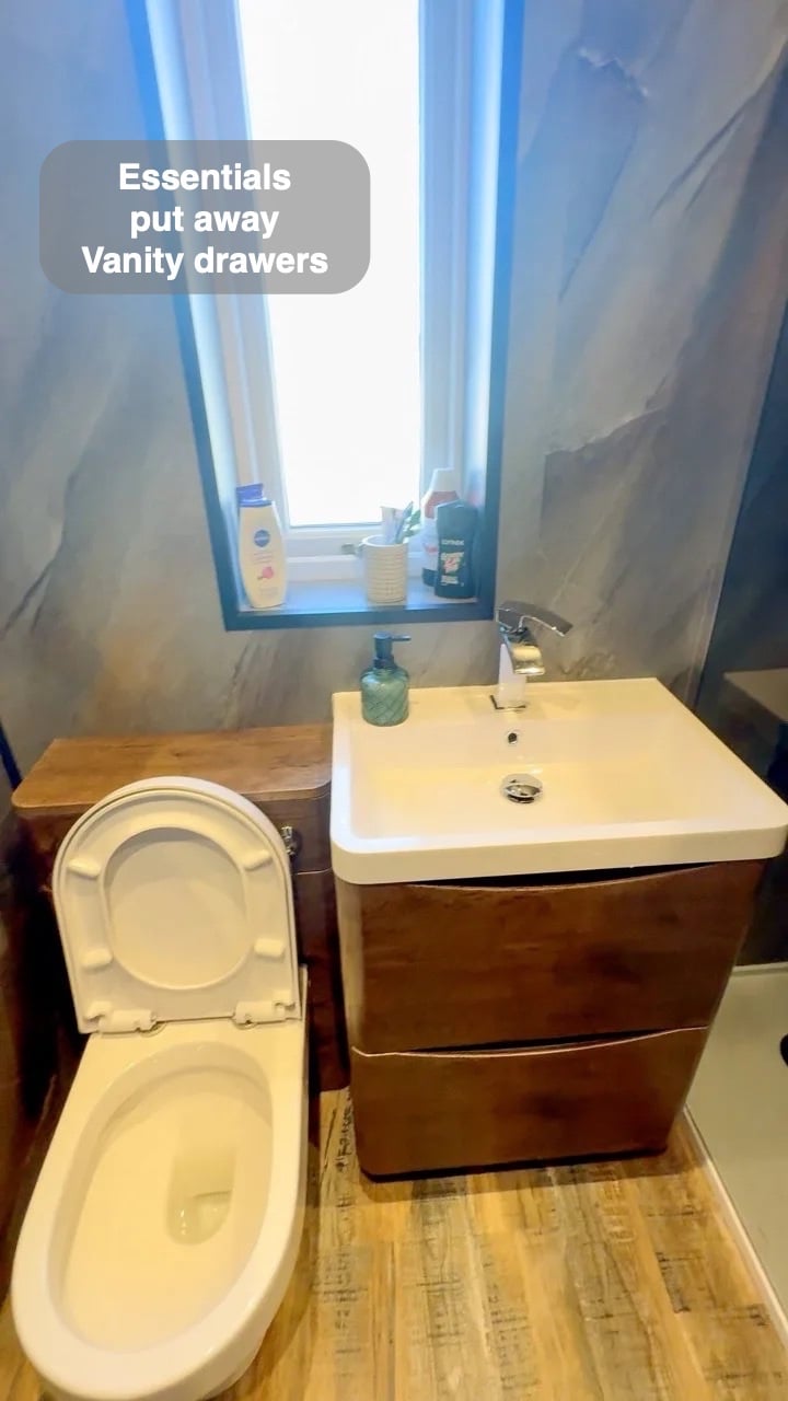 Storage close to the basin in the completed Mastrick bathroom