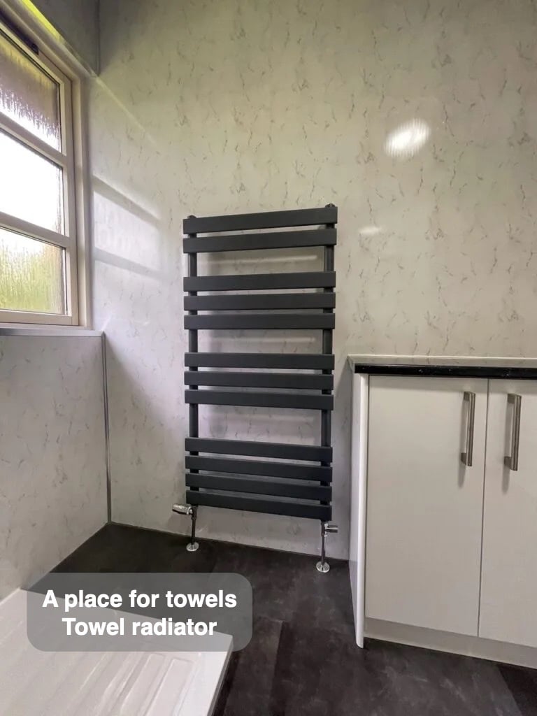 Towels have their own place in the completed Banchory bathroom