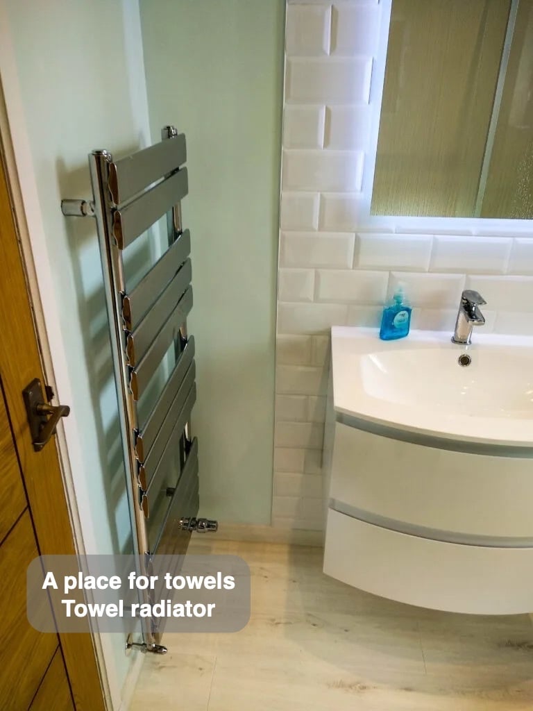 Towels have their own place in the completed Stonehaven bathroom