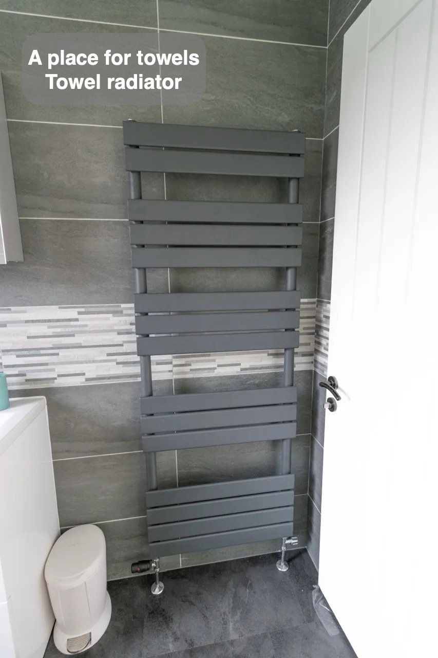 Towels have their own place in the completed Cove bathroom