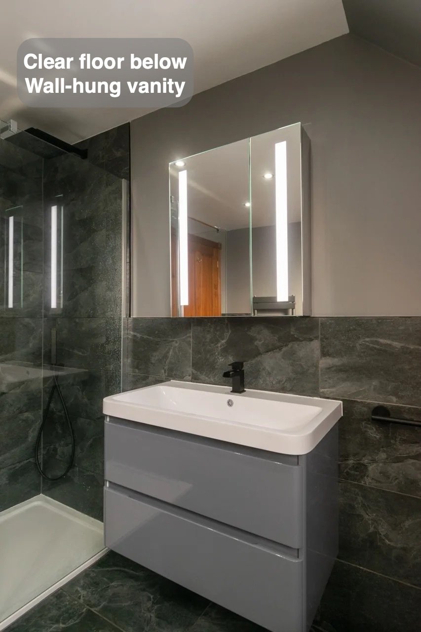 A clearer floor beneath the basin in the completed Bridge of Don bathroom