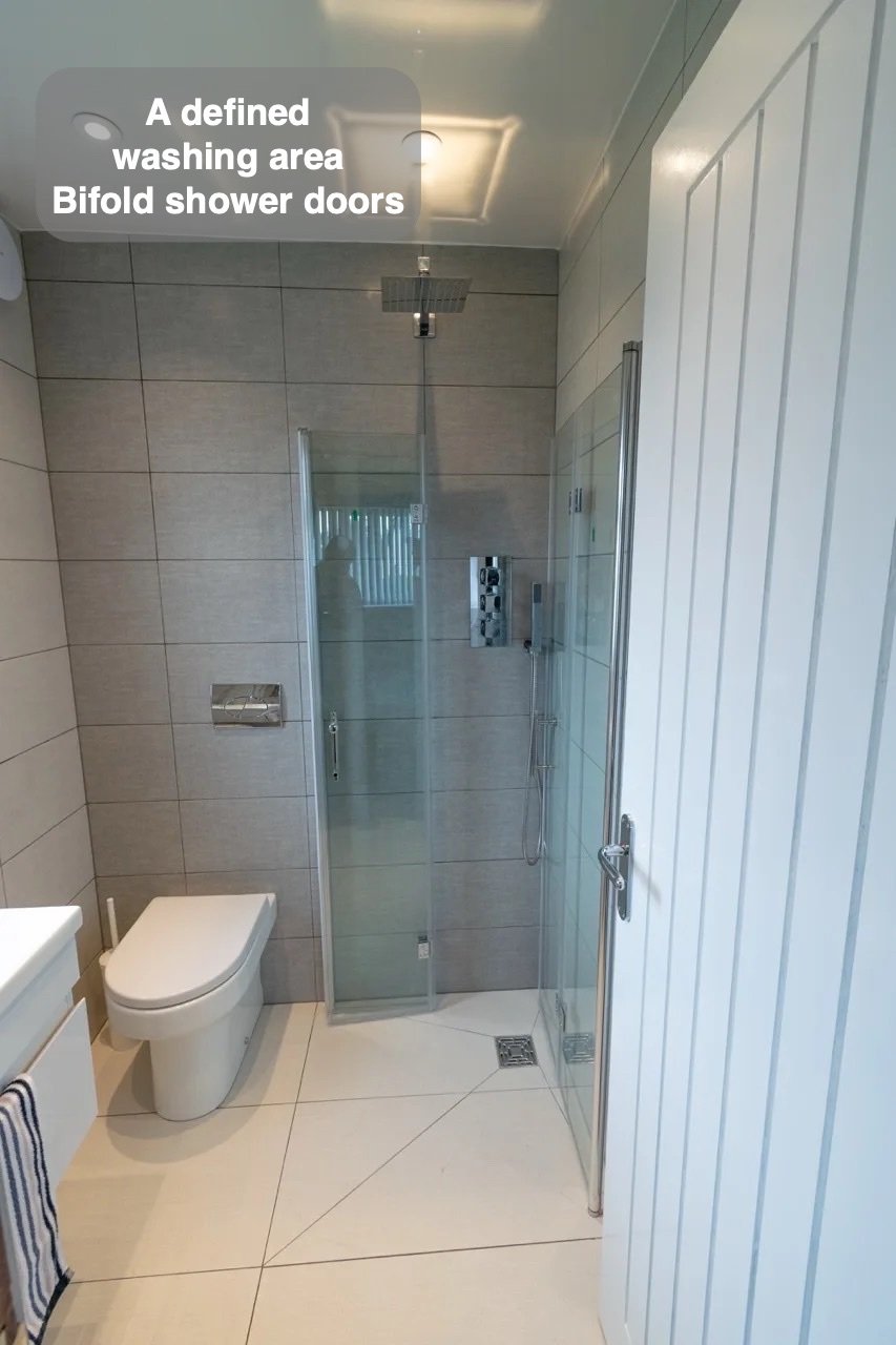 Bifold shower doors