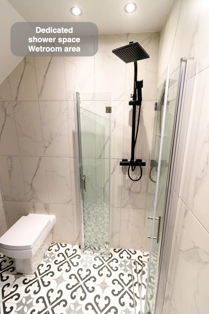 A defined wetroom area in the completed West End, Aberdeen bathroom