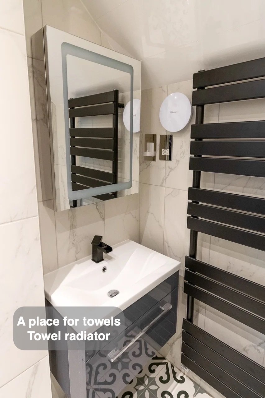 Towels have their own place in the completed West End, Aberdeen bathroom
