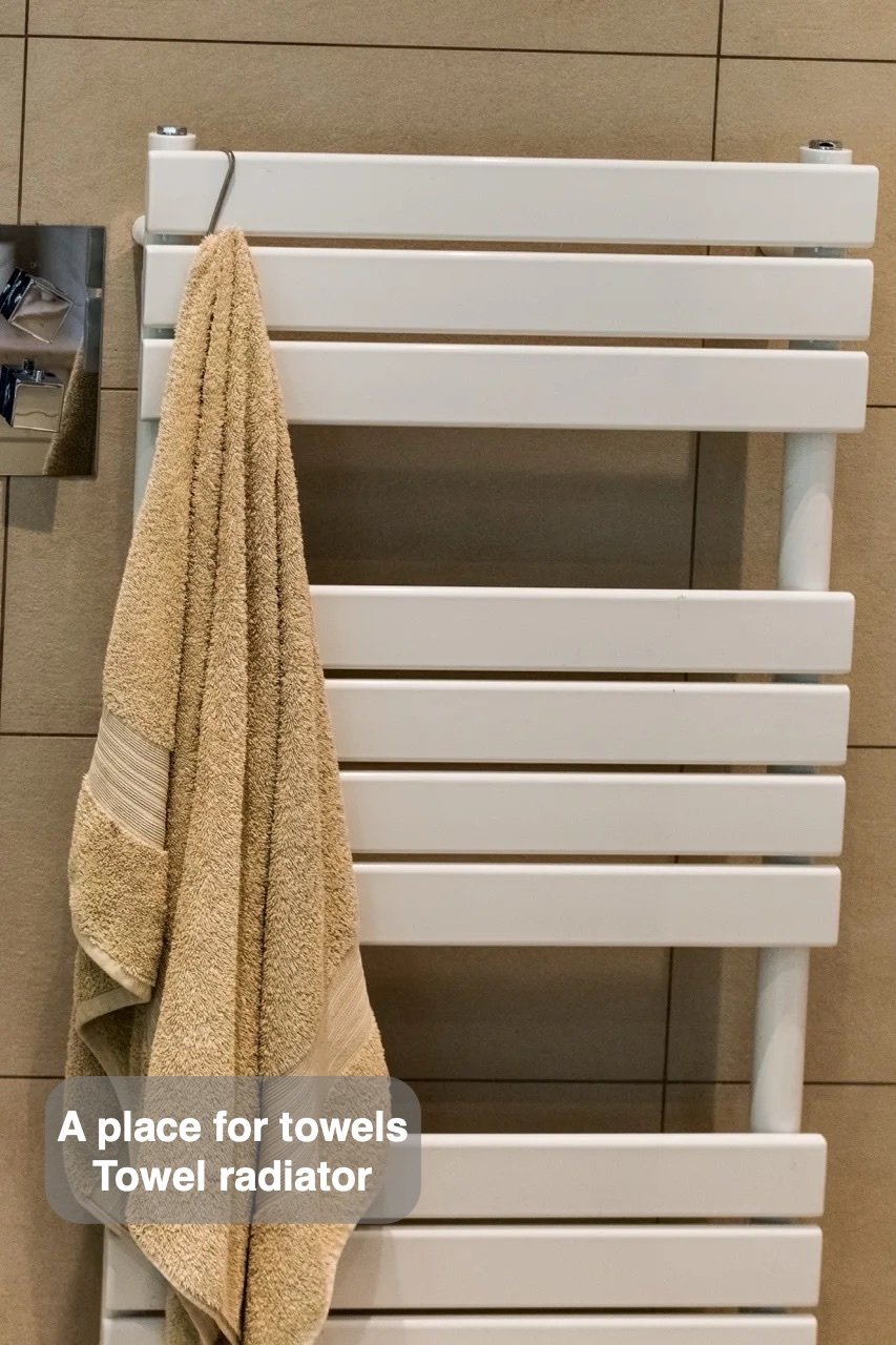 Towels have their own place in the completed Northfield, Aberdeen bathroom