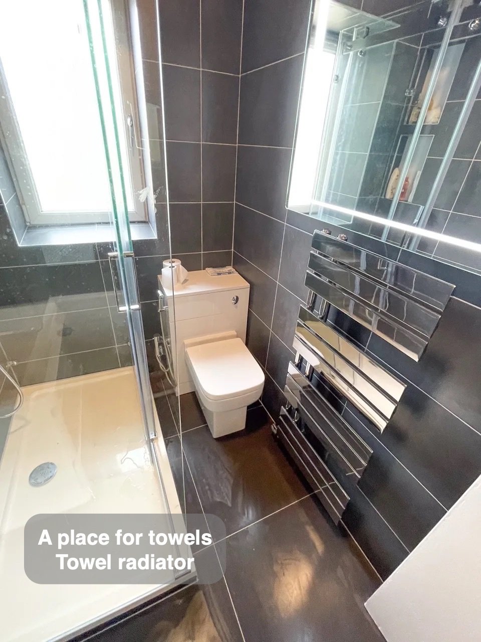 Towels have their own place in the completed West End, Aberdeen bathroom