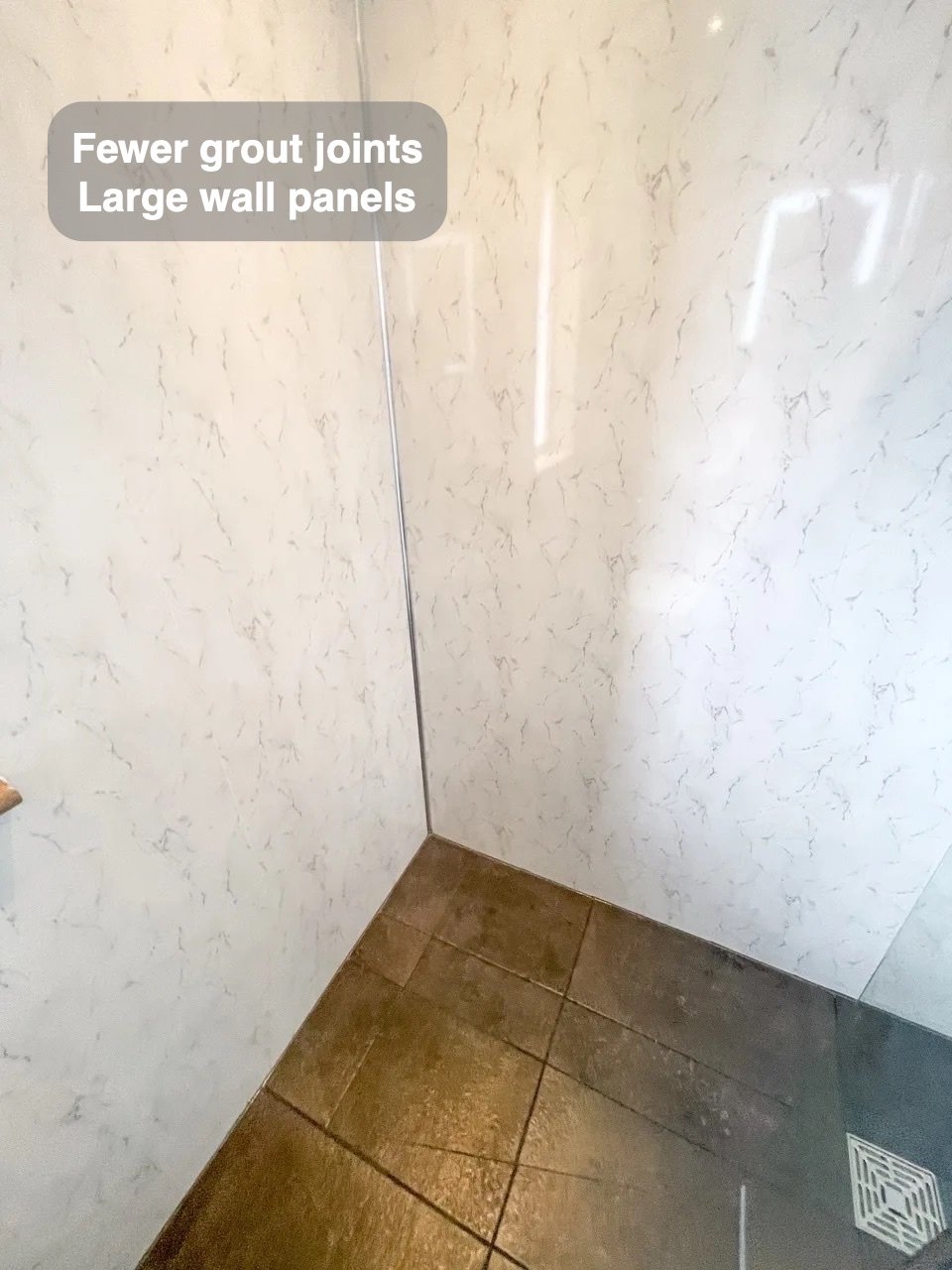 Broad surfaces for regular wiping in the completed Cove bathroom