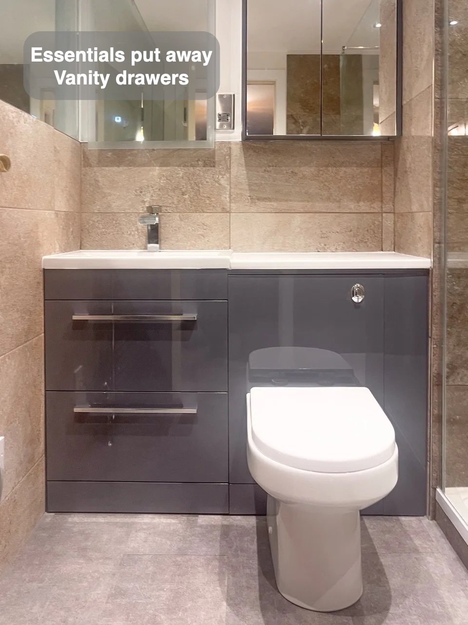 Storage close to the basin in the completed Rosemount, Aberdeen bathroom