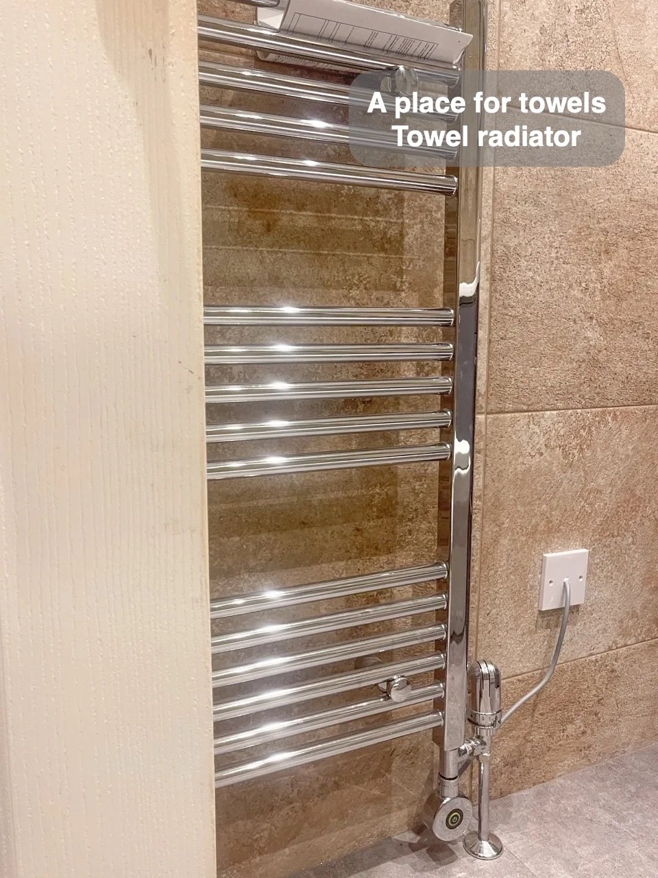 Towels have their own place in the completed Rosemount, Aberdeen bathroom