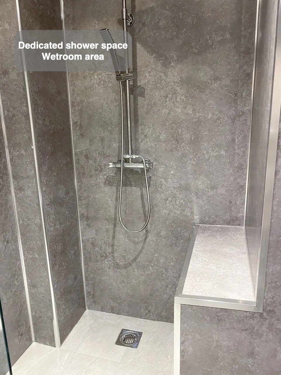 A defined wetroom area in the completed Rosemount, Aberdeen bathroom