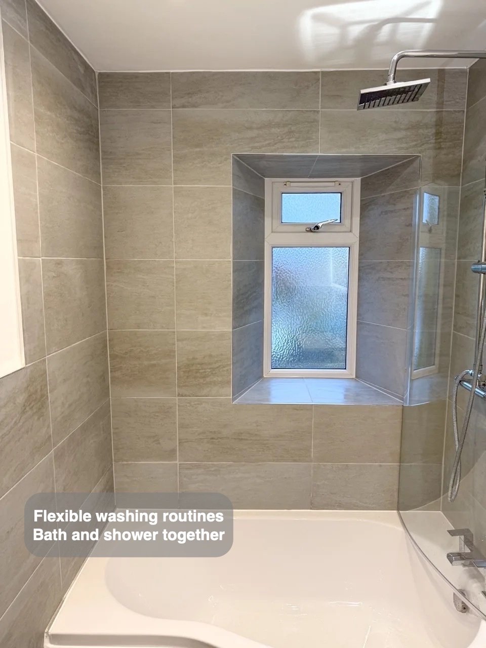 P-shaped bath beneath window