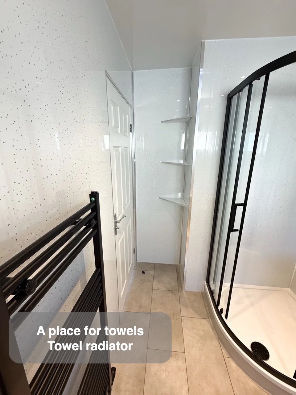 A dedicated place for towels in Aberdeen bathroom
