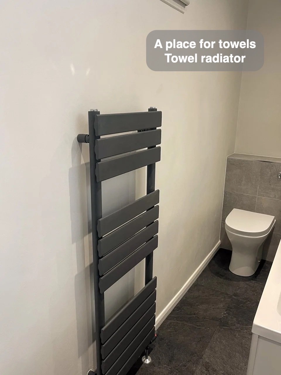 Towels have their own place in the completed Ferryhill bathroom