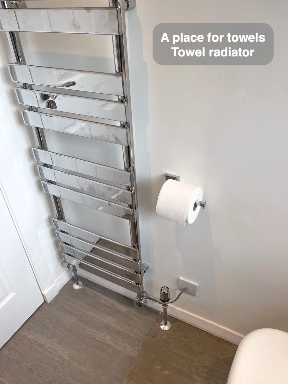 Towels have their own place in the completed Mastrick, Aberdeen bathroom
