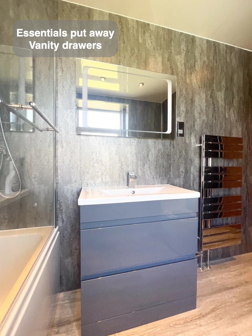 Storage close to the basin in the completed Bucksburn bathroom
