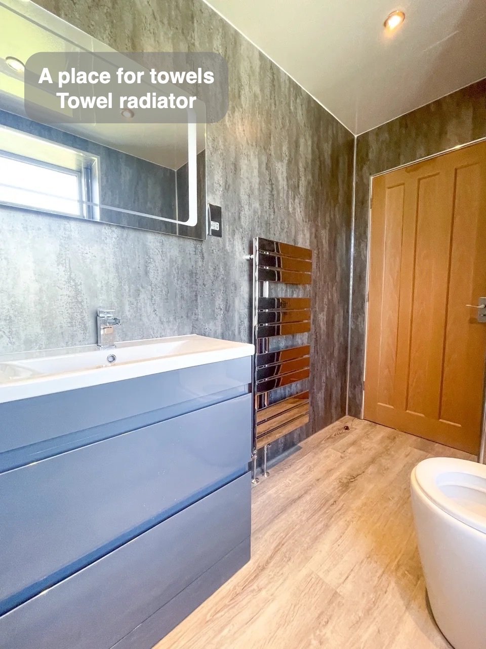 Towels have their own place in the completed Bucksburn bathroom
