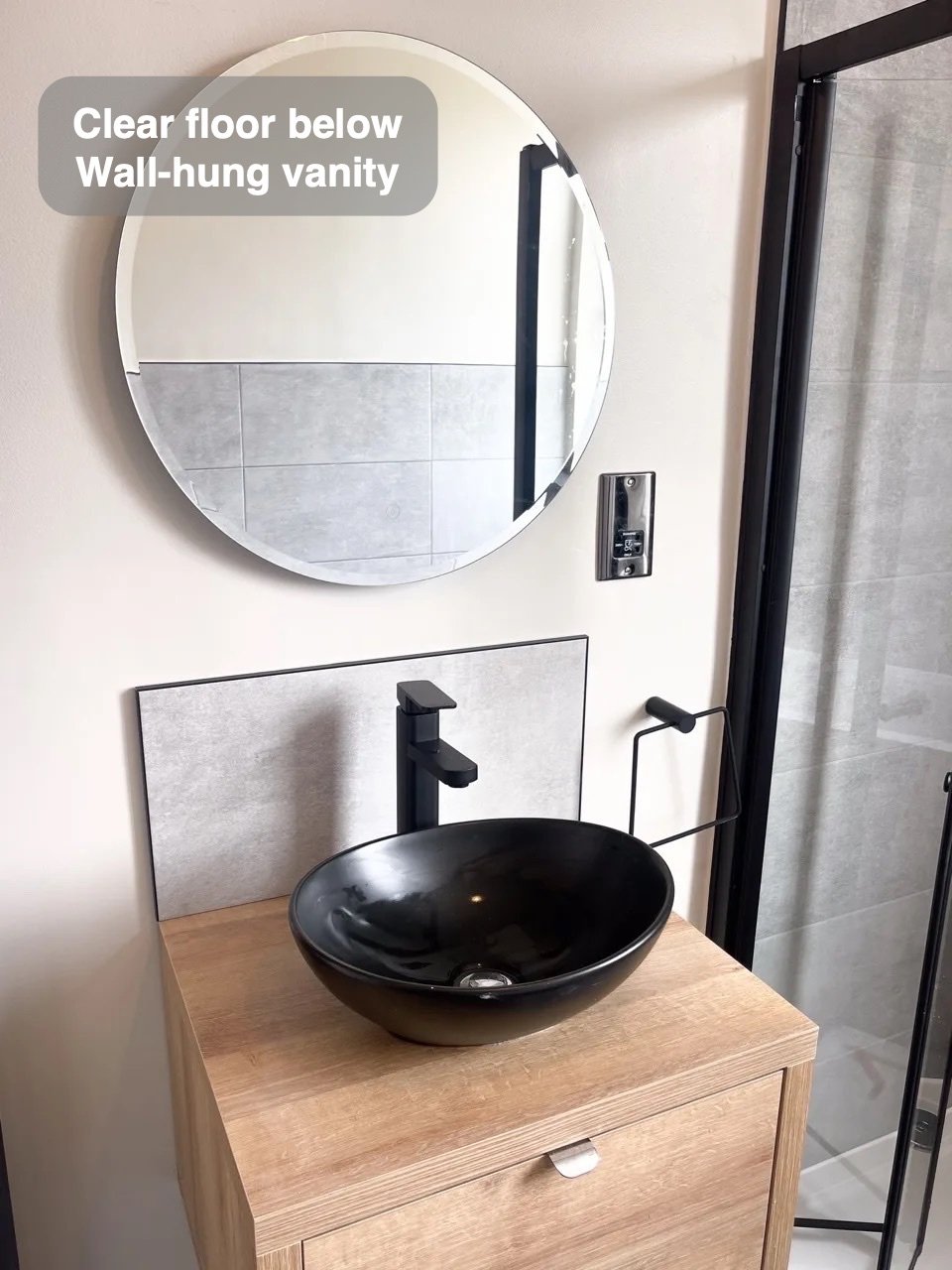 A clearer floor beneath the basin in the completed Mannofield bathroom