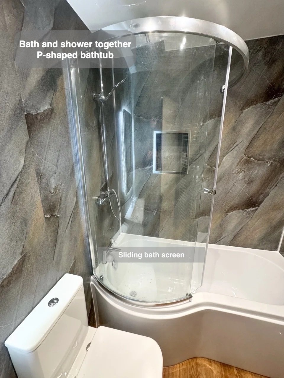 P-shaped bath and wraparound glass