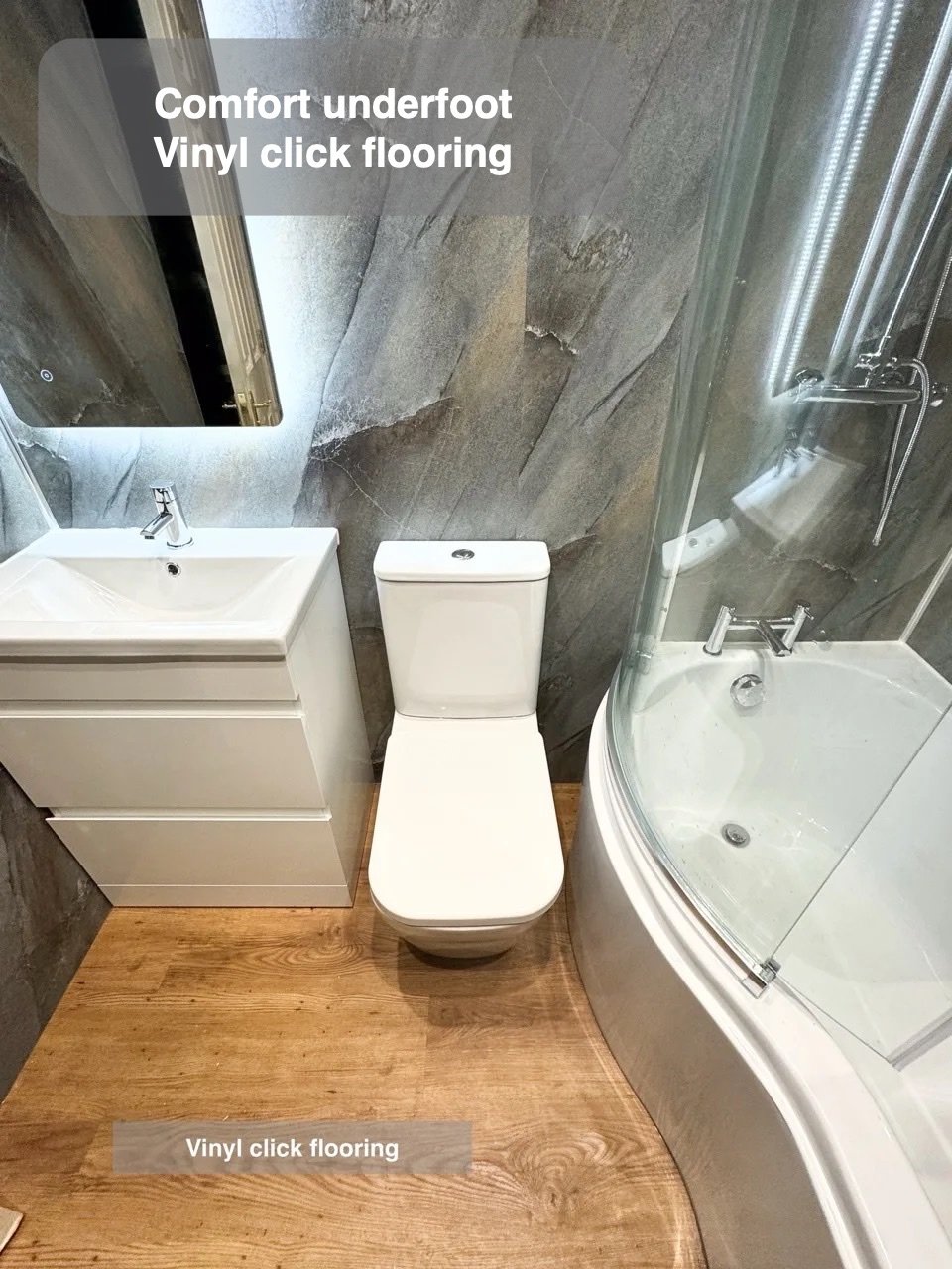 Basin and toilet beside bath