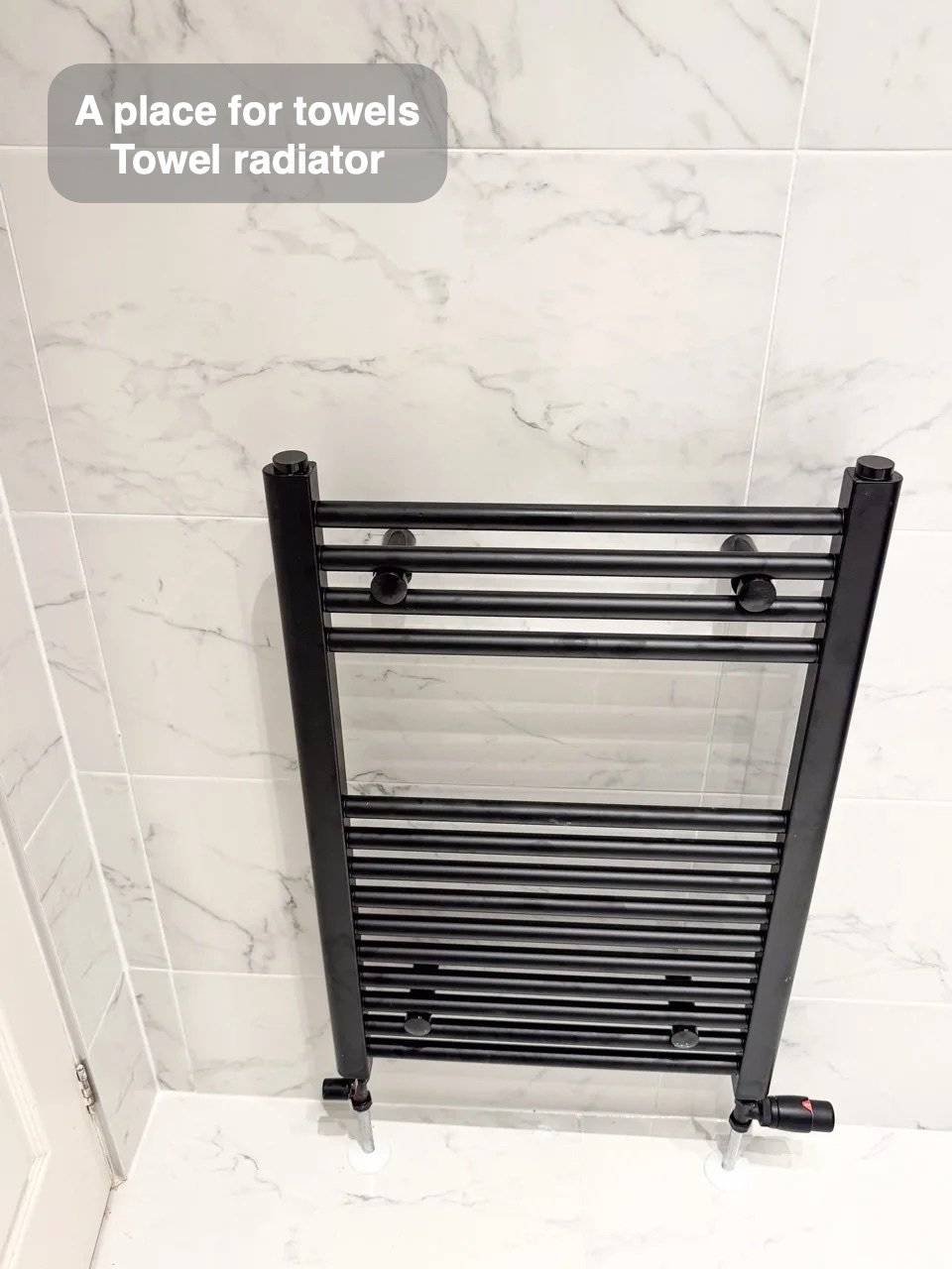 Towels have their own place in the completed Peterculter bathroom