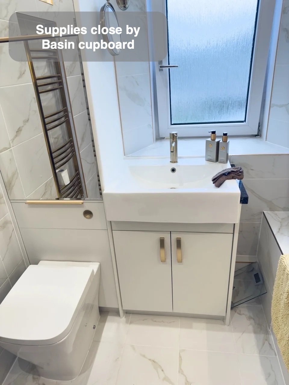 Storage around the toilet and basin in the completed Broomhill, Aberdeen bathroom