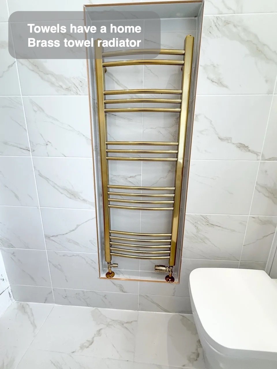 A place for towels in the completed Broomhill, Aberdeen bathroom