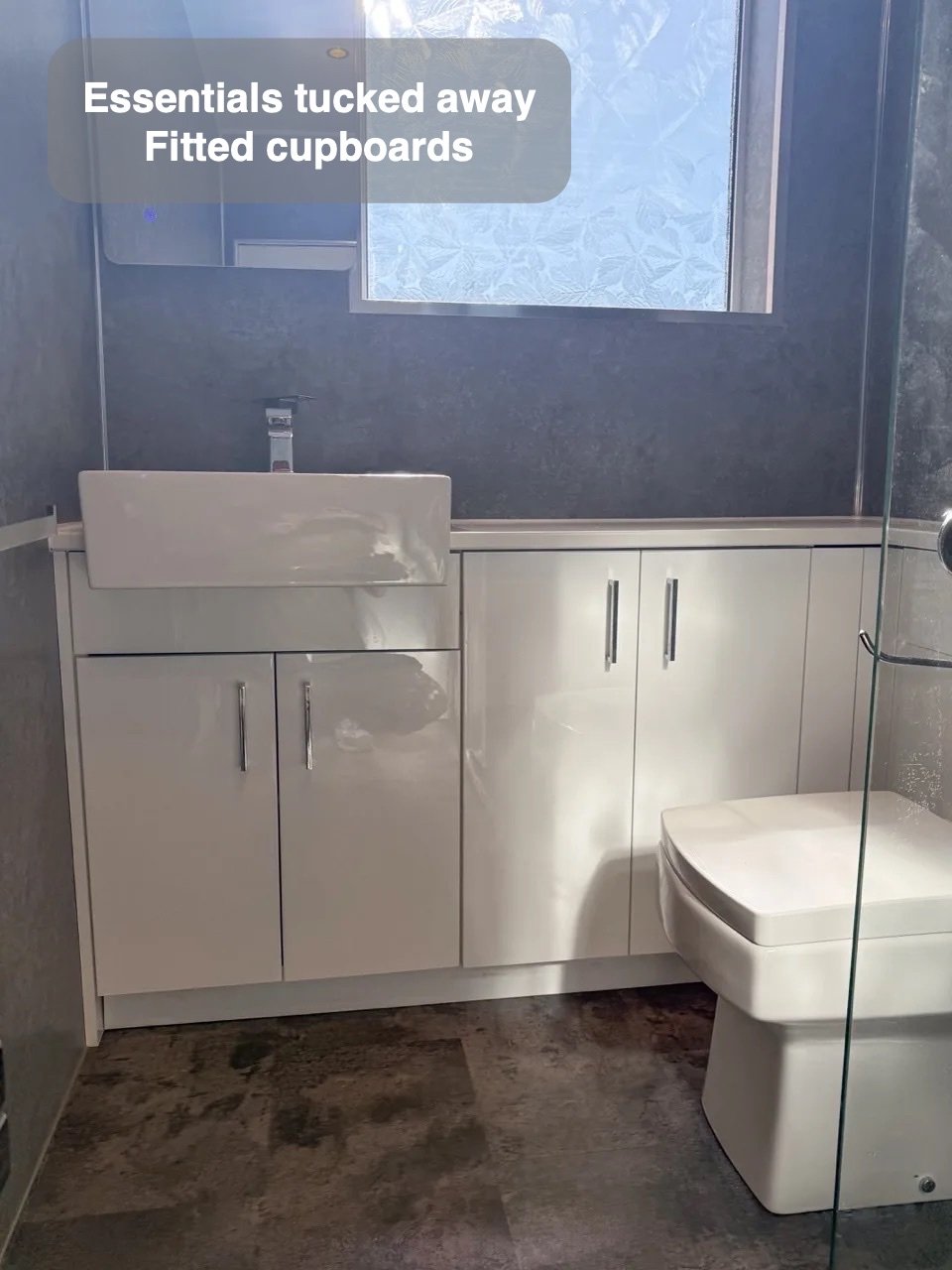 Storage around the corner in the completed Aberdeen bathroom