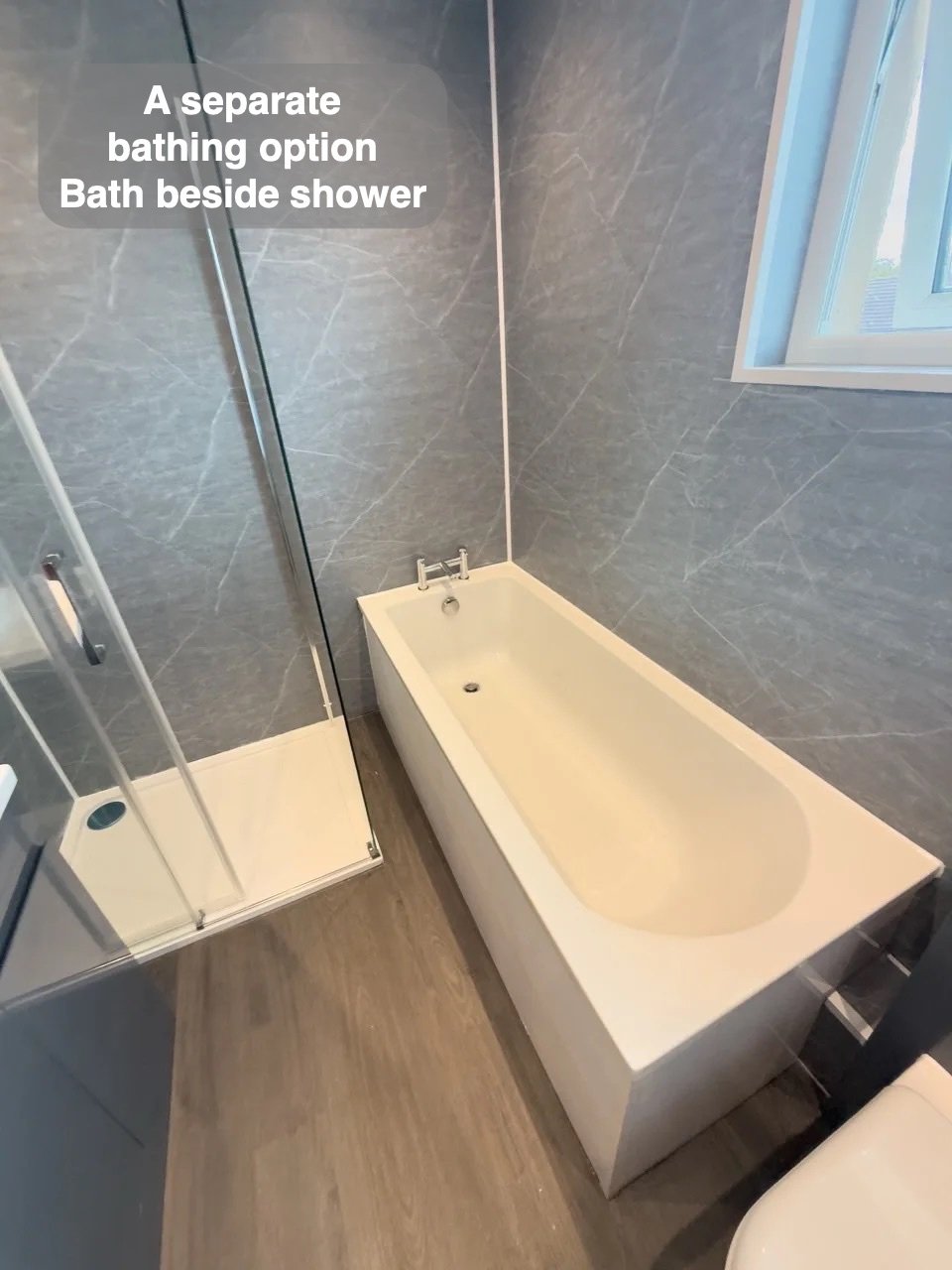 Bath beside shower