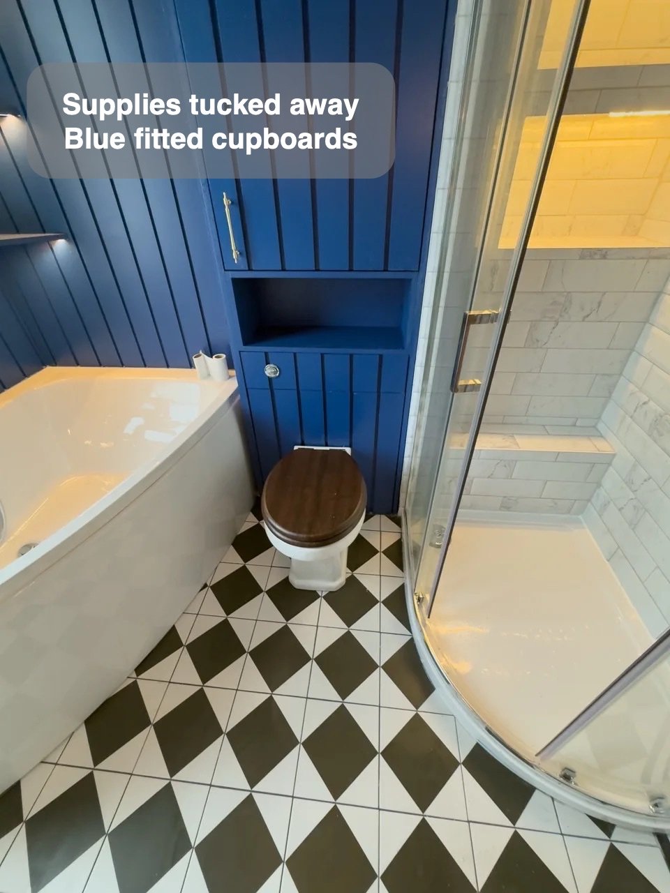 A coordinated floor and shower in the completed Rosemount, Aberdeen bathroom