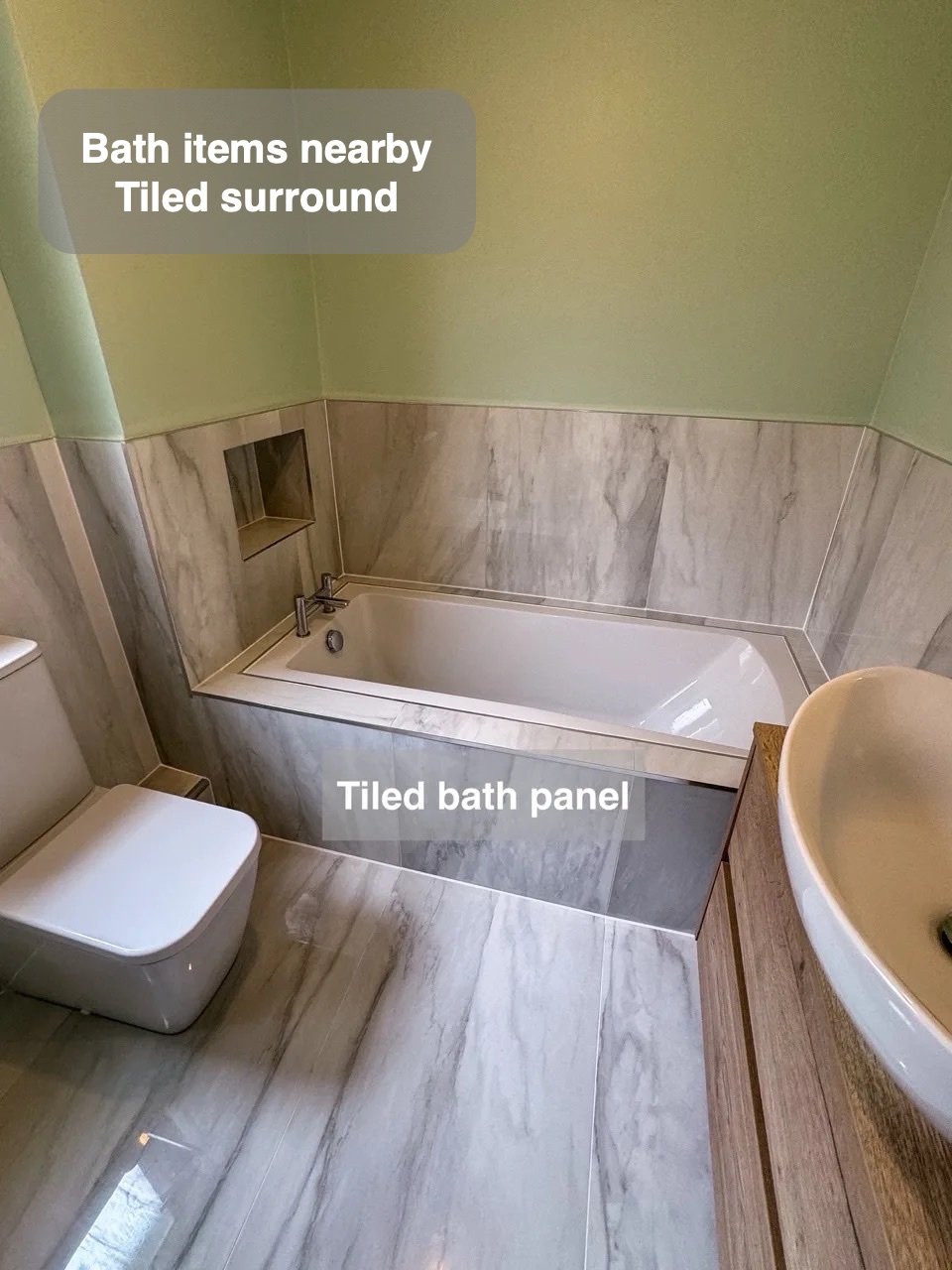 A useful edge around the bath in the completed Kintore bathroom