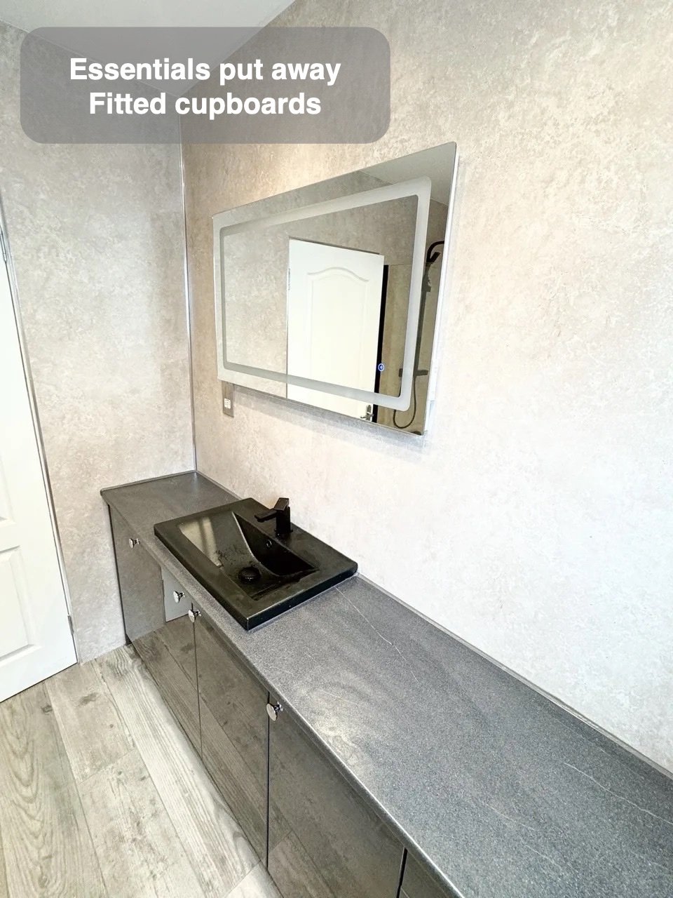 Storage fitted into the layout in Mastrick, Aberdeen bathroom