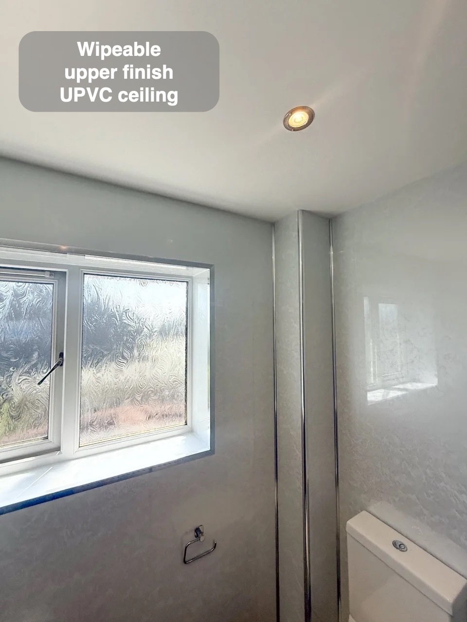 UPVC ceiling above panelled shower room