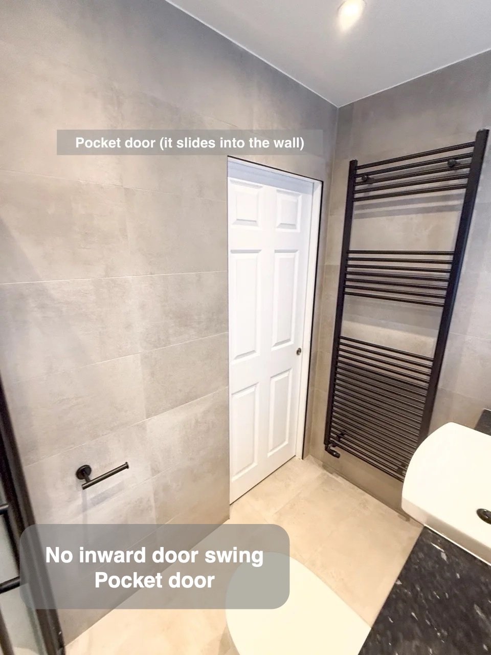 An entrance without an inward swing in Cove bathroom