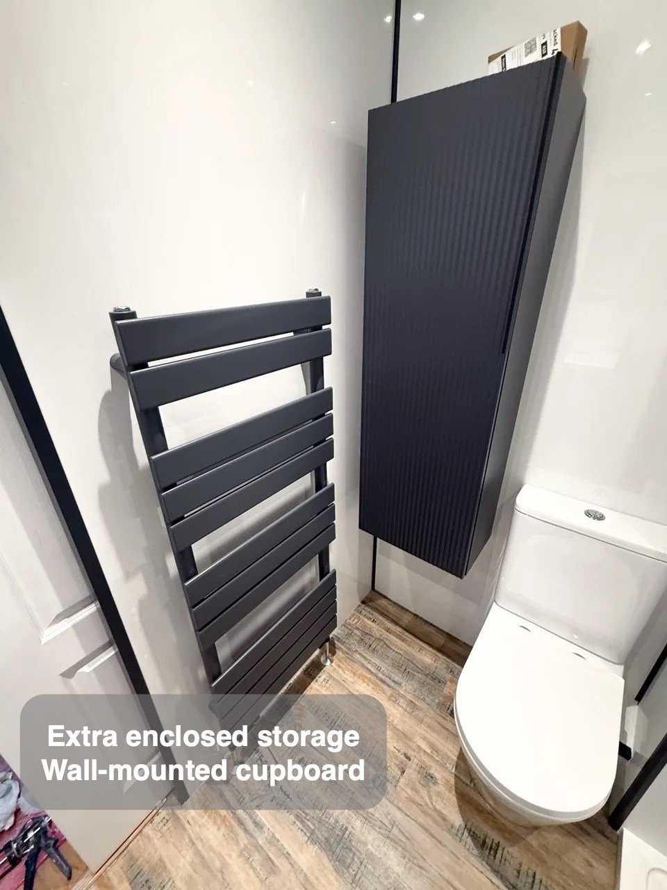Storage without more floor furniture in the completed Stonehaven bathroom