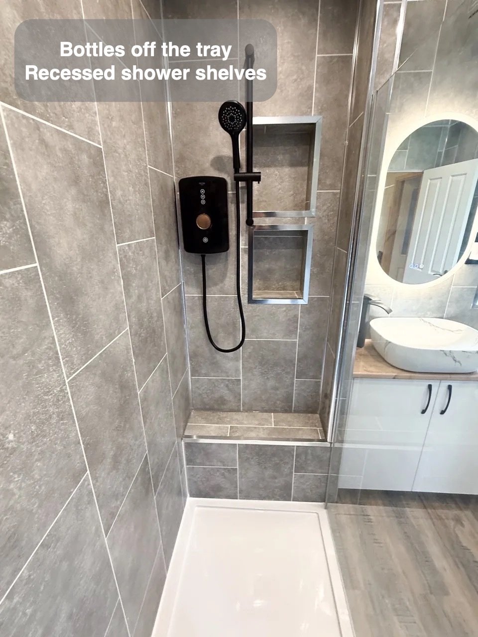 A shower with a place to pause in the completed Aberdeen bathroom