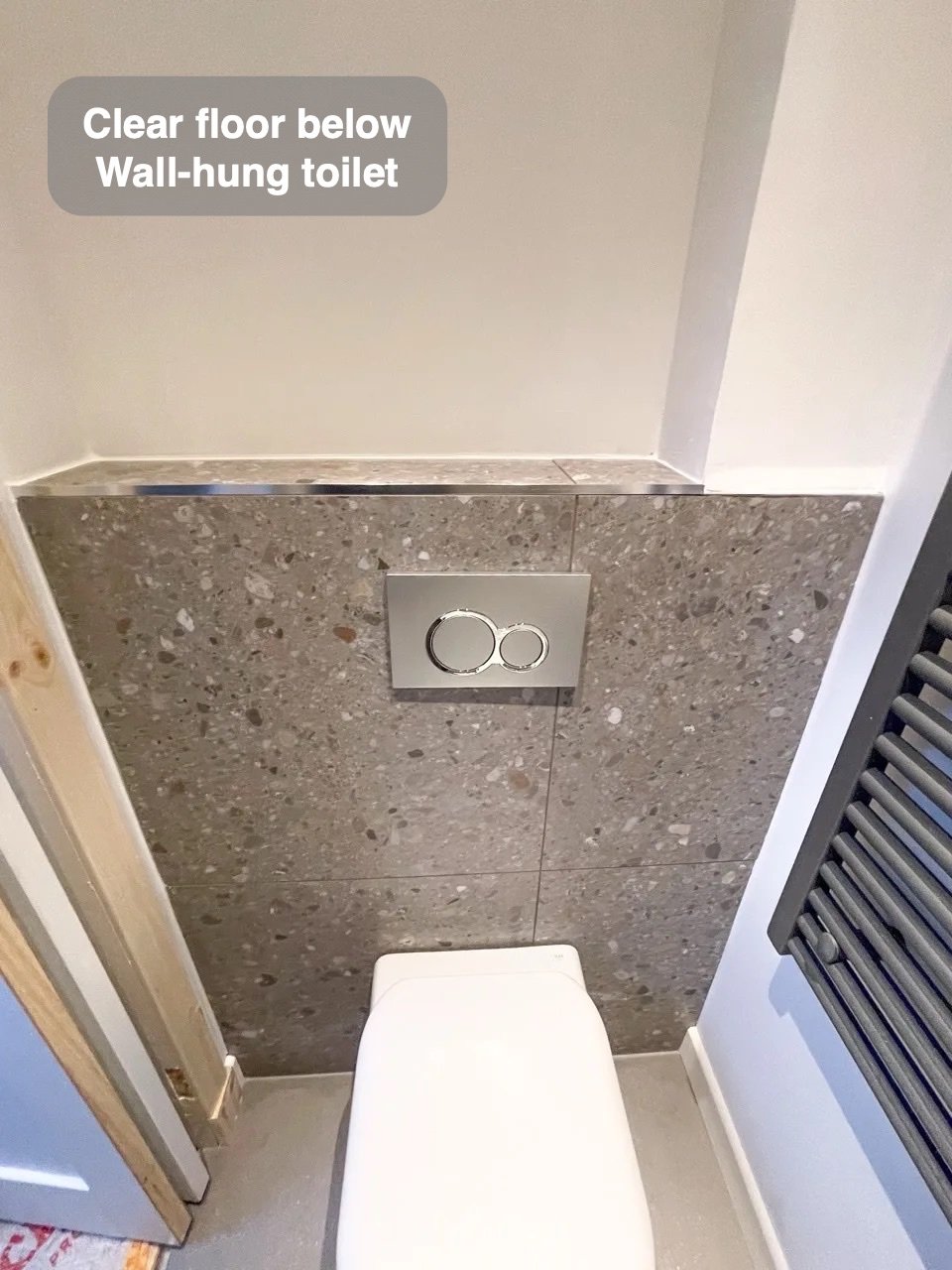 A clearer floor below the toilet in the completed Belhelvie bathroom