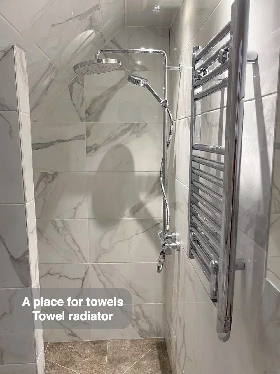 Towels have their own place in the completed Inverurie bathroom