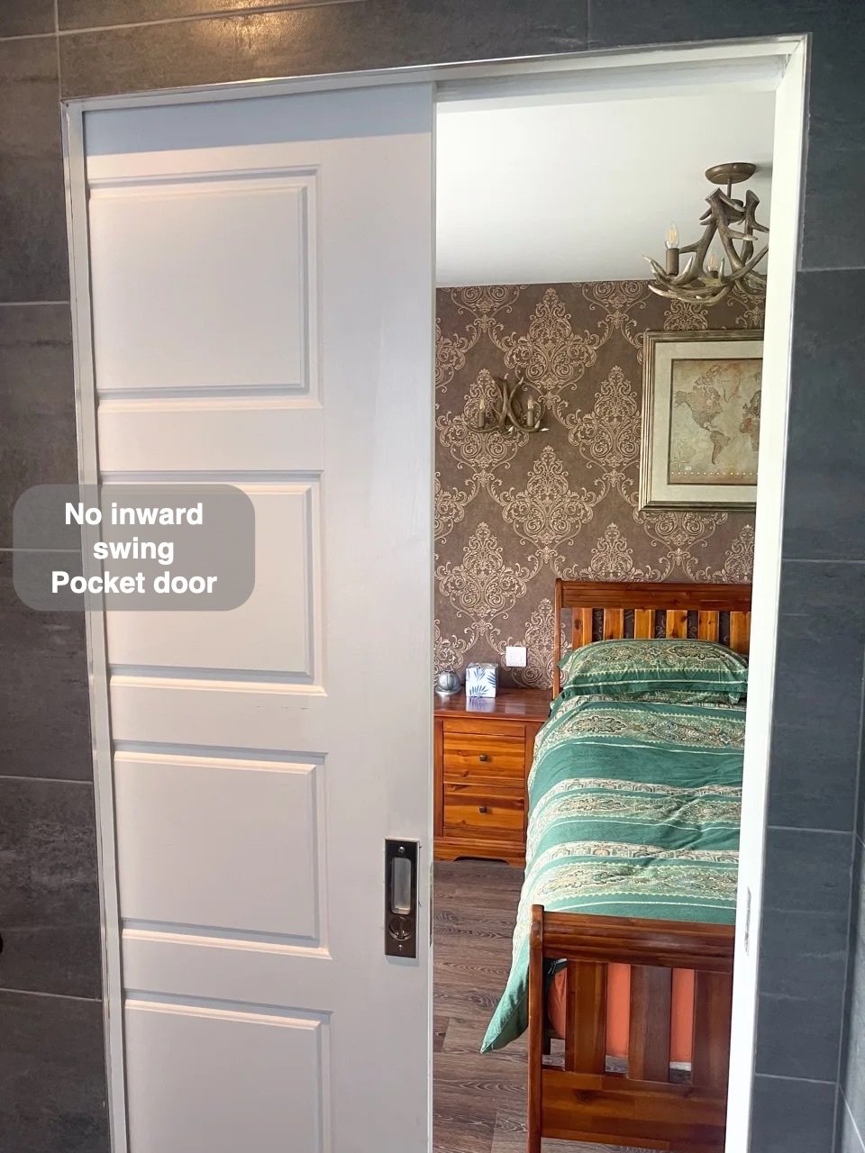 An entrance without an inward swing in Newmacher bathroom